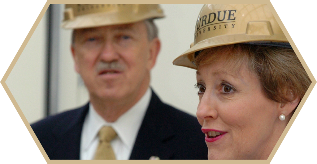 Man and woman in yellow hard hats - Discovery Park District at Purdue - Purdue Research Foundation