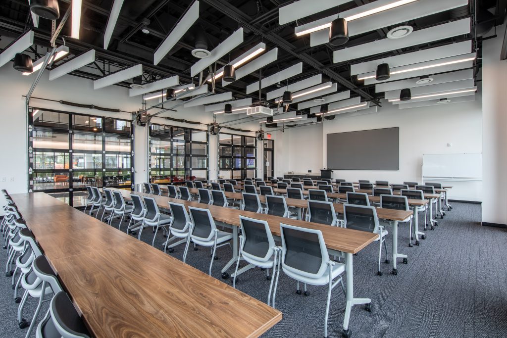 Rows of chairs and tables in a Convergence Center meeting room - Discovery Park District - Purdue Research Foundation